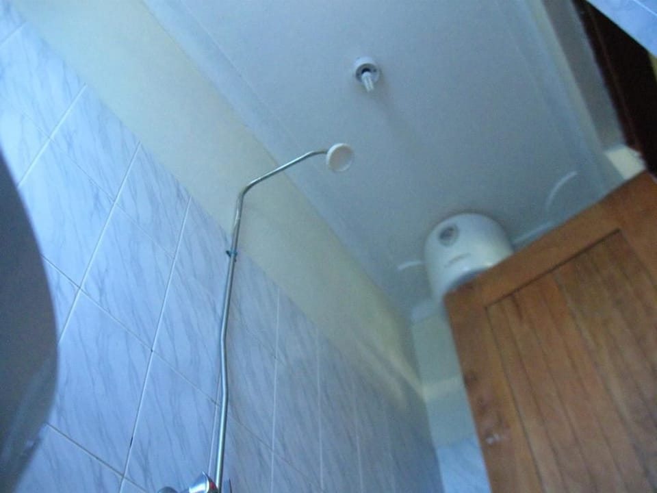 Twin Room | Bathroom | Shower, rainfall showerhead, towels, soap