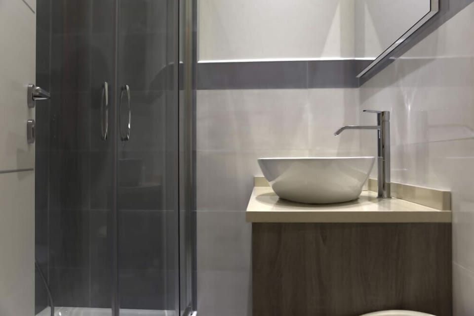 Suite, Jetted Tub (Nuvole e coccole) | Bathroom | Free toiletries, hair dryer, towels, soap