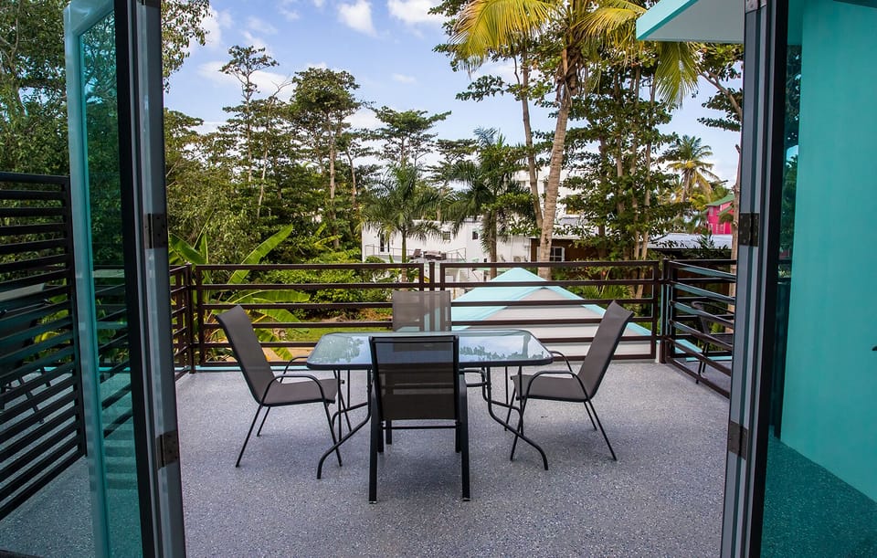 Private balcony with partial ocean views