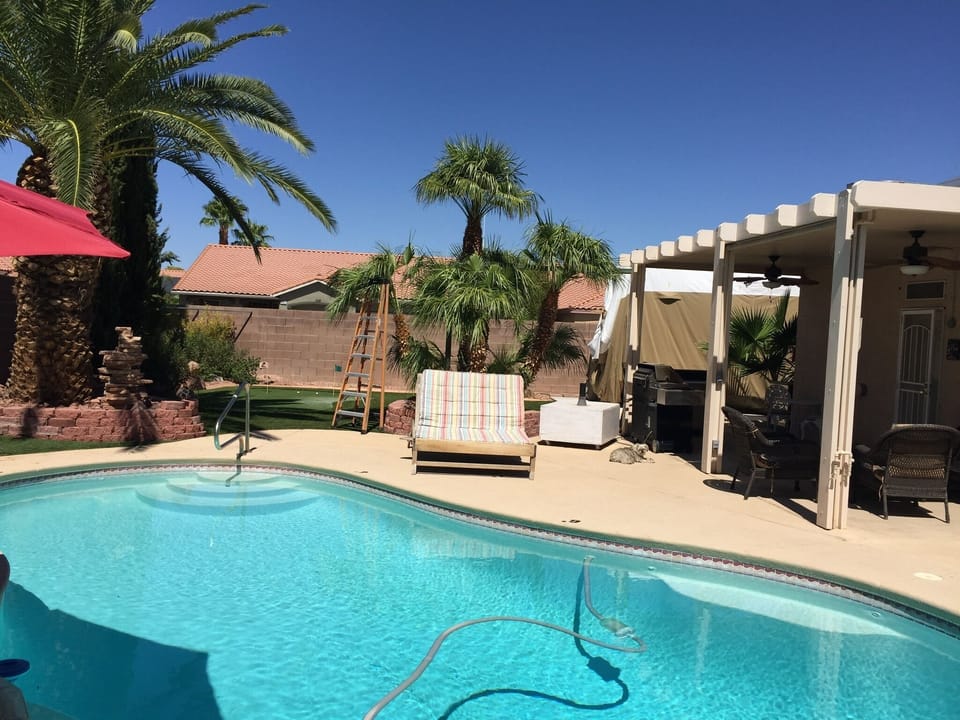 Lounge or swim in the private backyard 