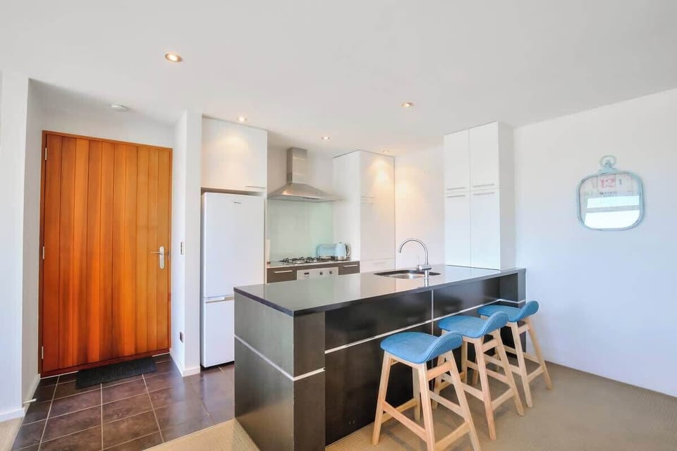 Modern, fully equipped kitchen, with complimentary condiments, spices, tea, coffee and all the utensils you'll need to cook a great meal.