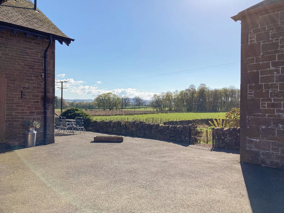 Spacious picturesque courtyard with parking for at least 7 vehicles | Halleaths Home Farm, Lochmaben