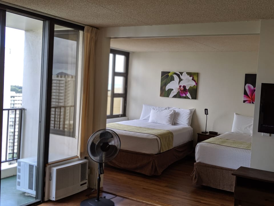 Two queen beds in bedroom
