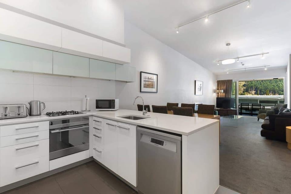 Modern, fully equipped kitchen, with complimentary condiments, spices, tea, coffee and all the utensils you'll need to cook a great meal.