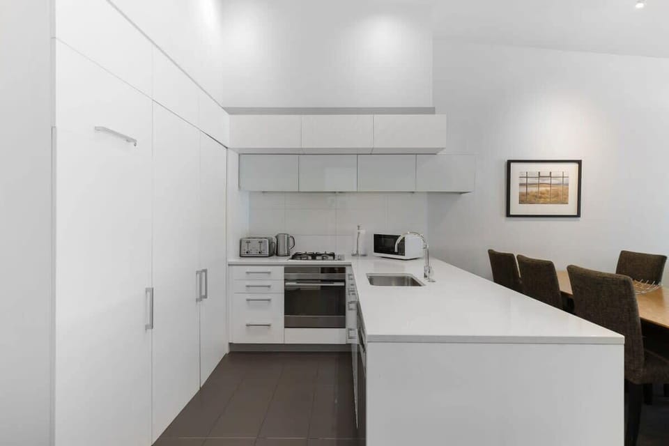 Modern, fully equipped kitchen, with complimentary condiments, spices, tea, coffee and all the utensils you'll need to cook a great meal.