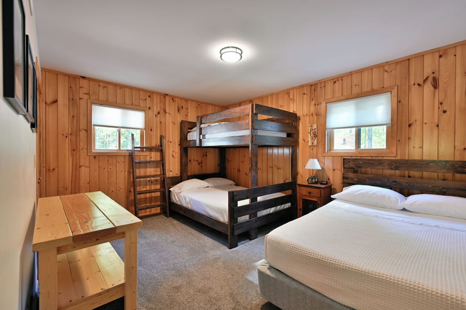2 full beds and a twin on top bunk