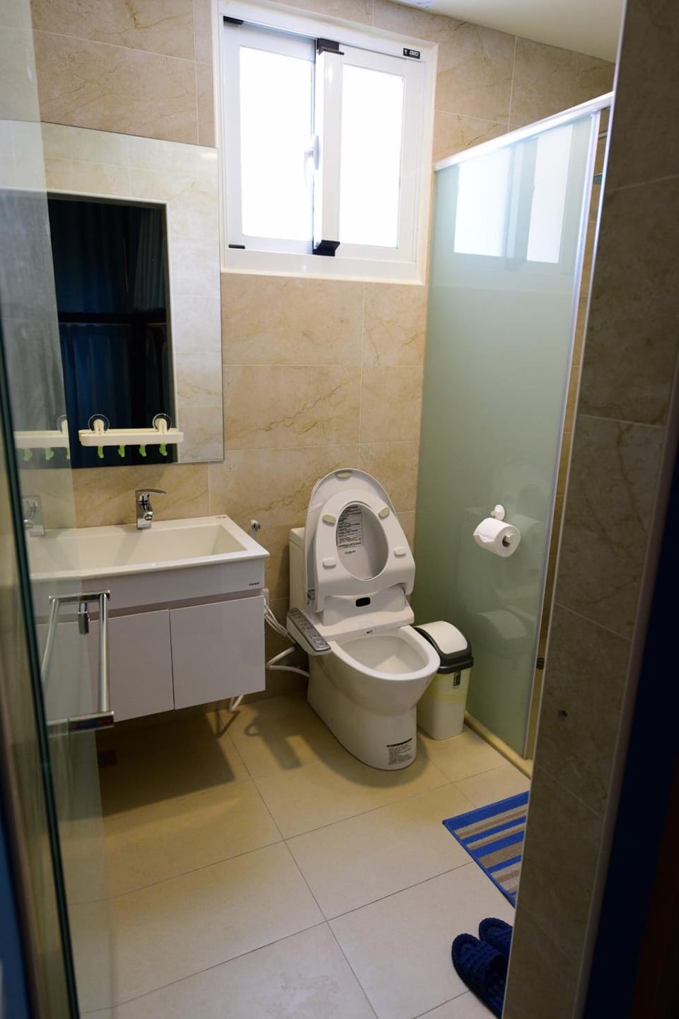 Shower, hair dryer, slippers, bidet