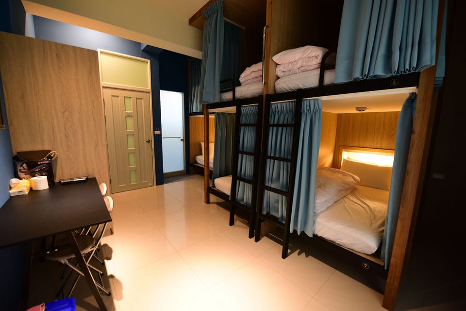 Basic Bed in 8-Bed Mixed Dormitory Room | Premium bedding, pillowtop beds, desk, laptop workspace