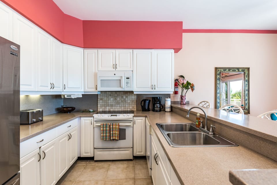 Full kitchen, blender, toaster, stove, oven, microwave, dishwasher, coffee maker