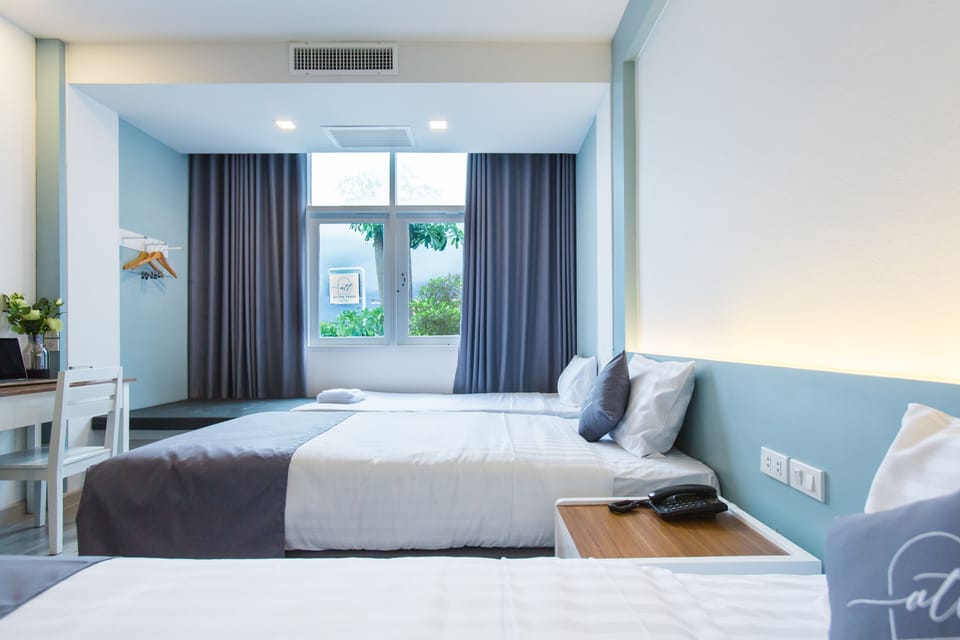 Standard Triple Room | Desk, blackout drapes, rollaway beds, free WiFi