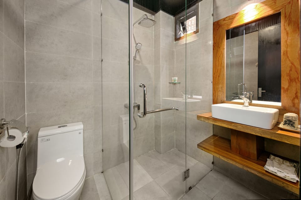 Shower, rainfall showerhead, designer toiletries, hair dryer