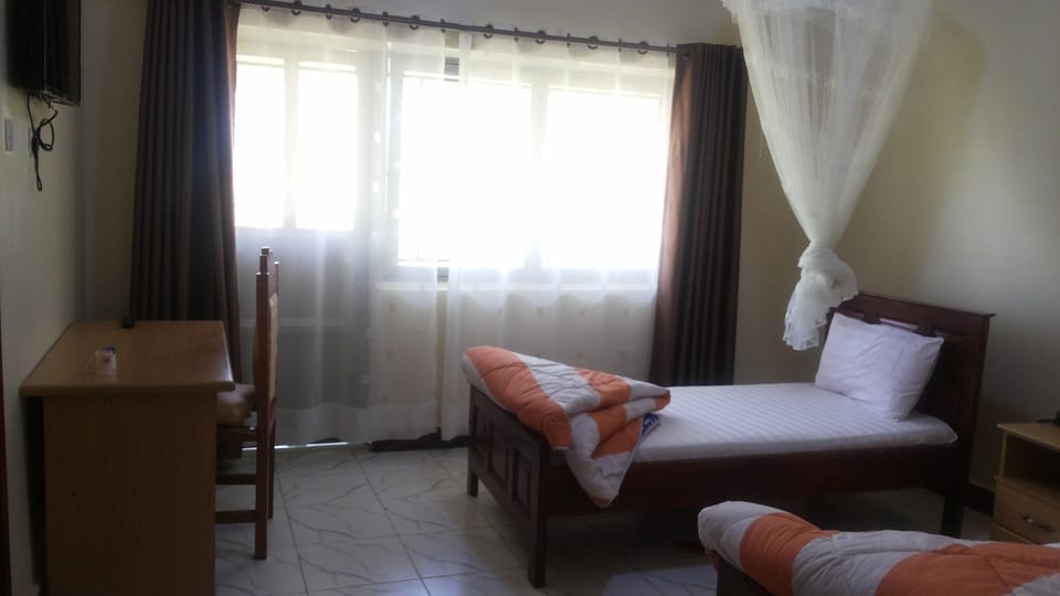 Executive Twin Room | Premium bedding, individually decorated, individually furnished, desk