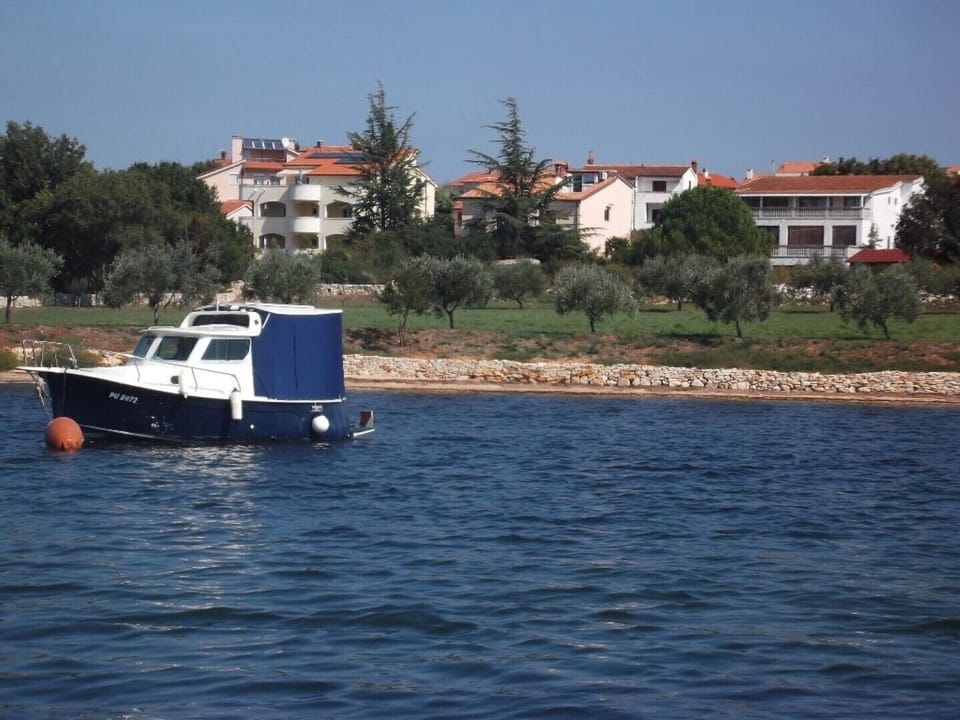 Air-conditioned apartment 250 m from the beach with private boat mooring Apartment in Medulin