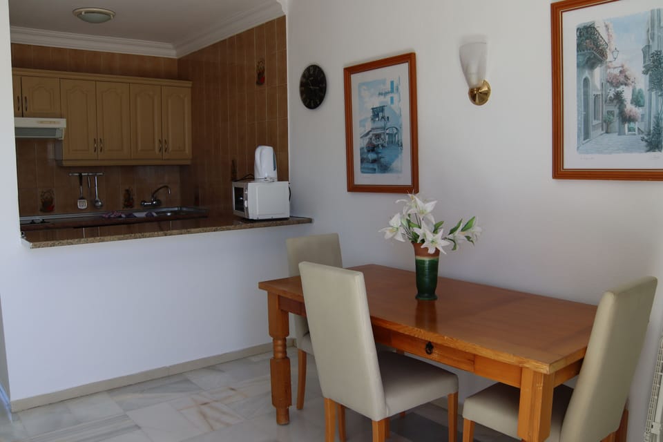 Apartment, 1 Bedroom, Balcony | Living area | LED TV