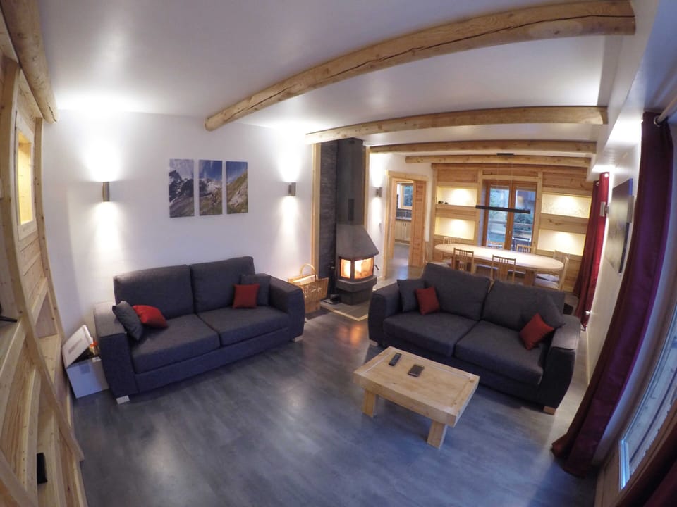 large lounge with log burner, satellite TV and netflix