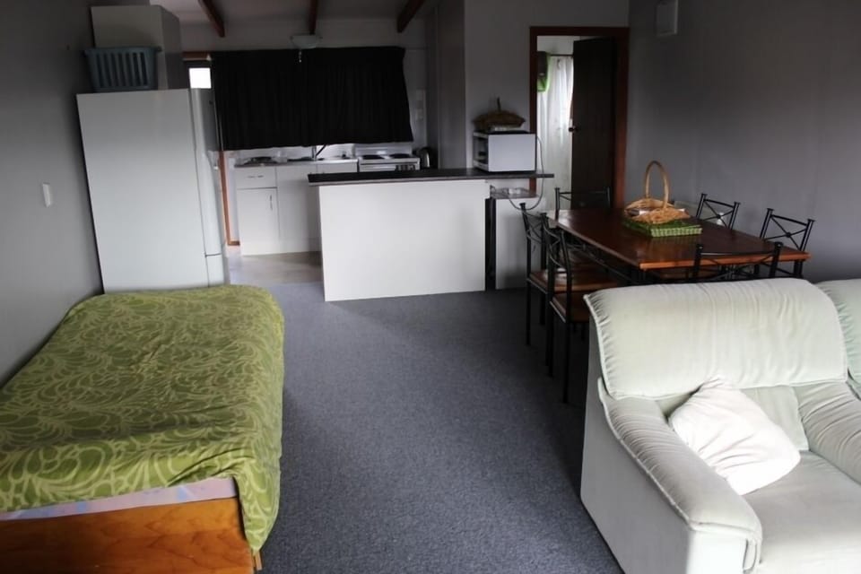 Single bed in lounge