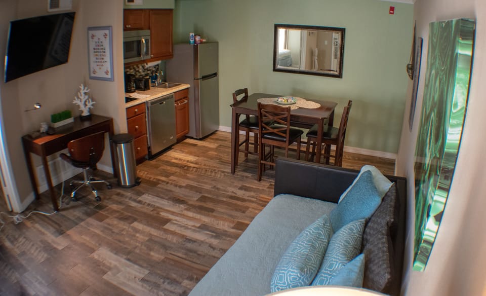 Living room, dinning area, desk, kitchenette