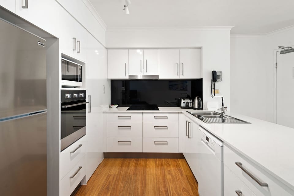 Deluxe Apartment, 2 Bedrooms | Private kitchen | Coffee/tea maker, full-size fridge, microwave, oven
