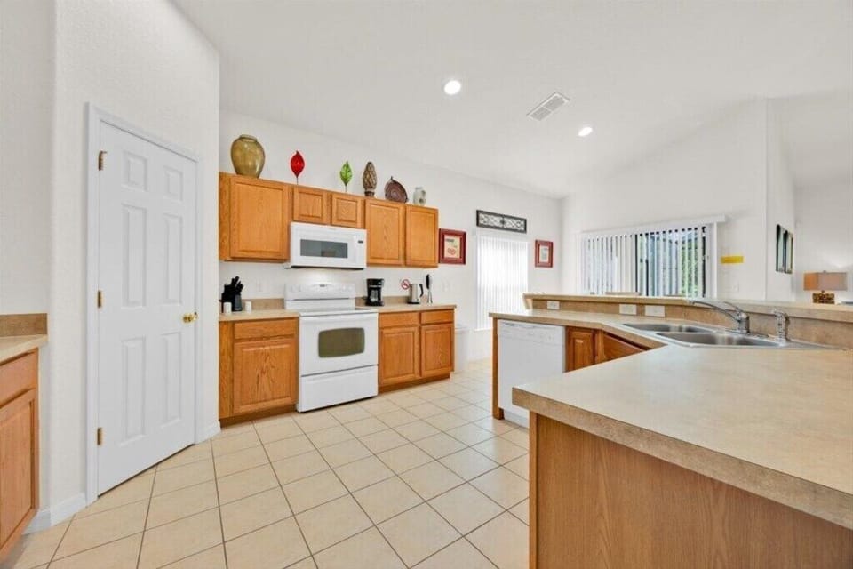 Spacious and well appointed kitchen with everything you need.