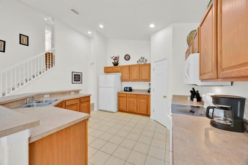 Spacious and well appointed kitchen with everything you need.