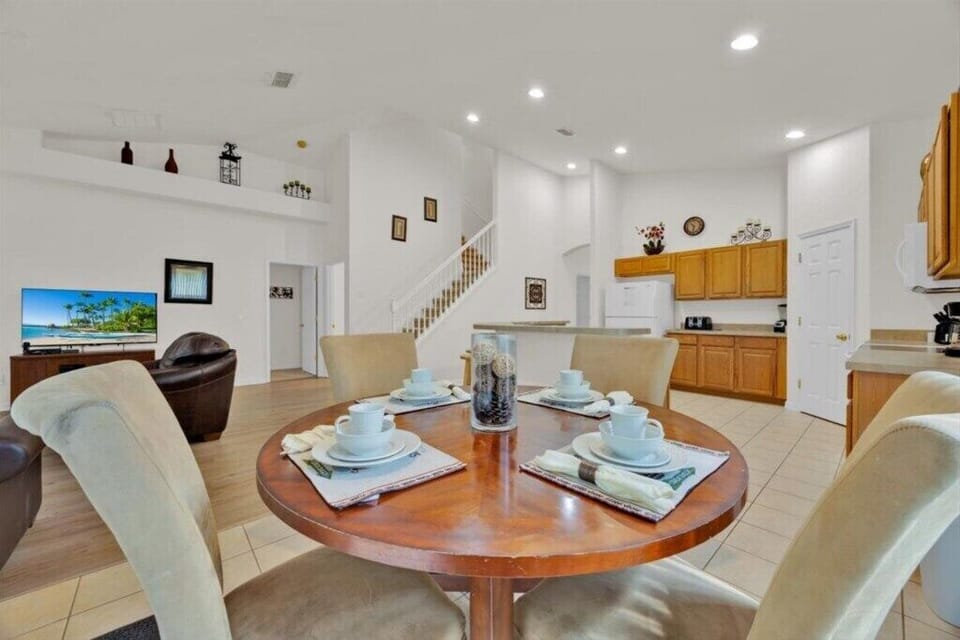 Breakfast table attached to kitchen, perfect for those quick meals.
