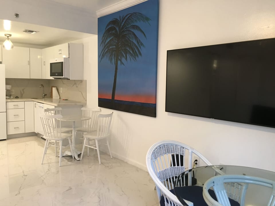 two nice tables and the Smart TV 65 "