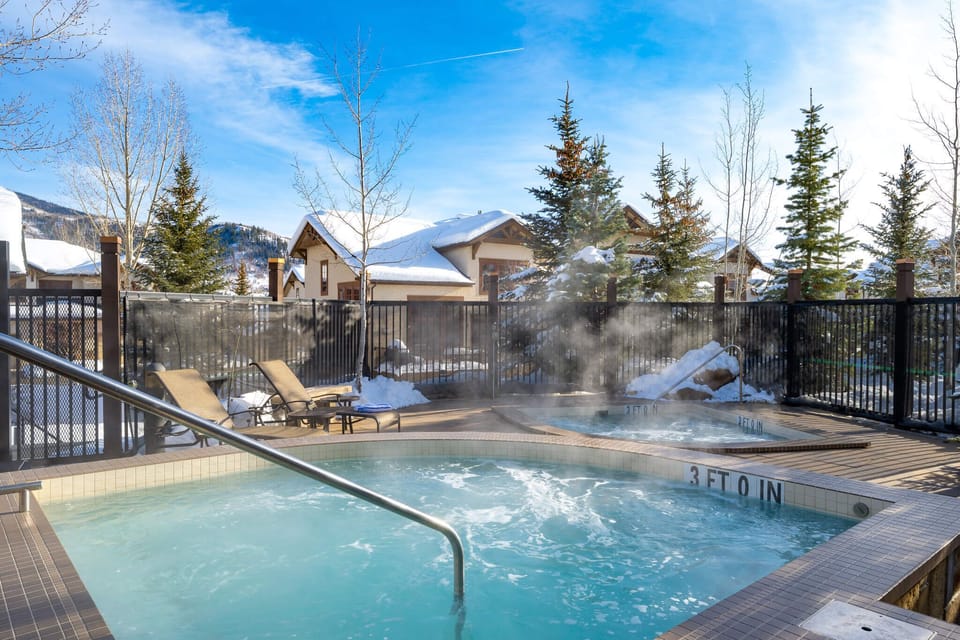 Enjoy the two hot tubs on cold ski days