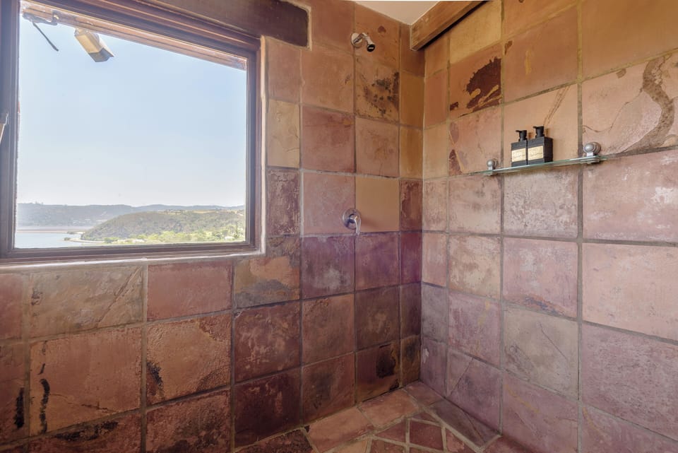 Suite, 1 King Bed, Lagoon View | Bathroom | Separate tub and shower, jetted tub, rainfall showerhead
