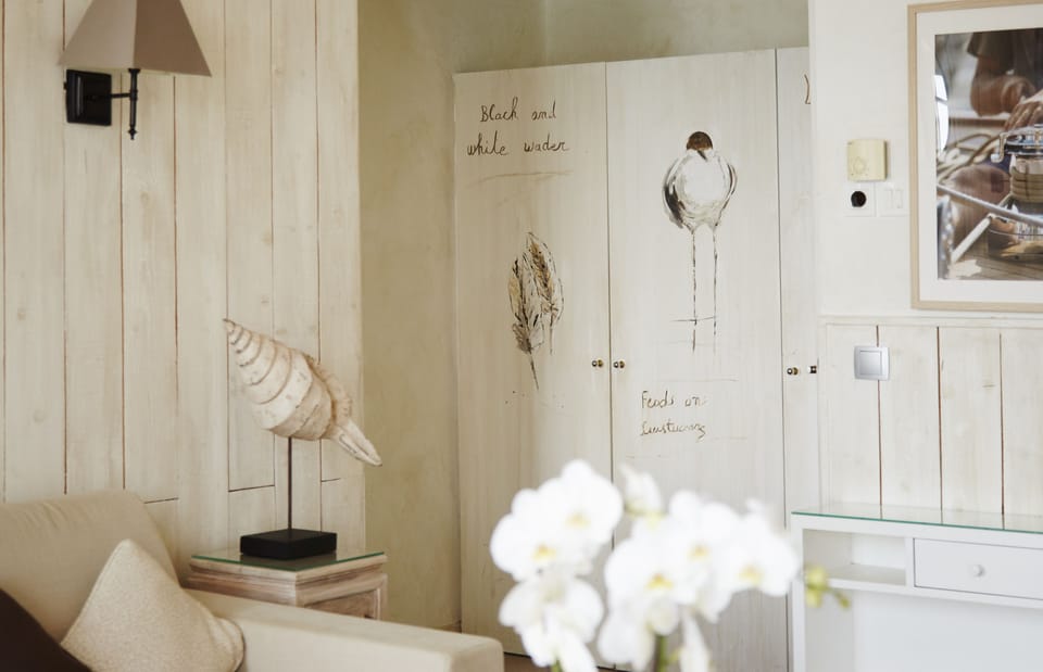 Suite, Sea View | Minibar, in-room safe, individually decorated, individually furnished