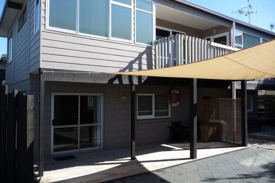 House from shaded parking bay