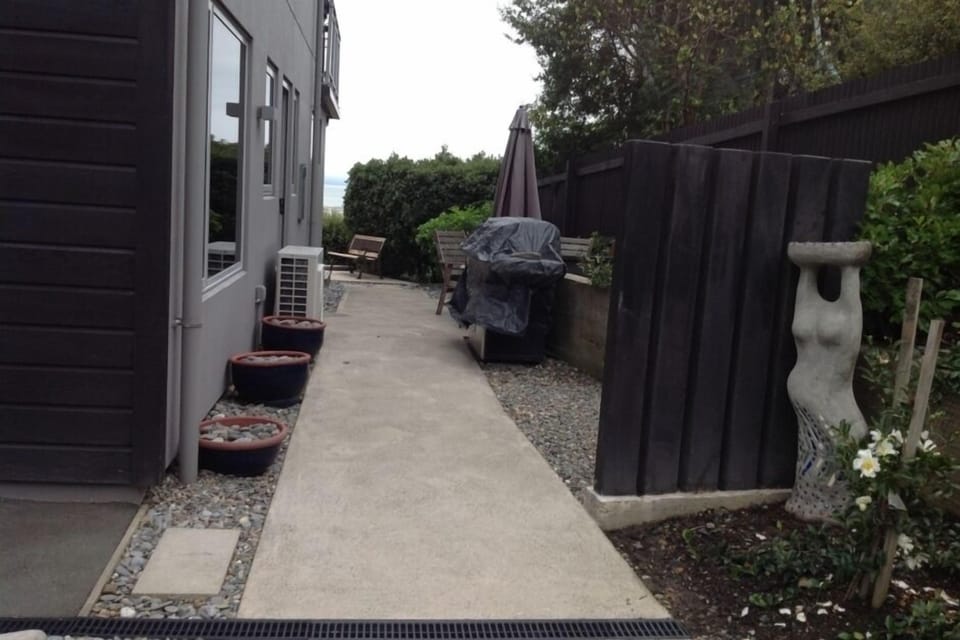 View of BBQ andamp; Entrance to Apartment