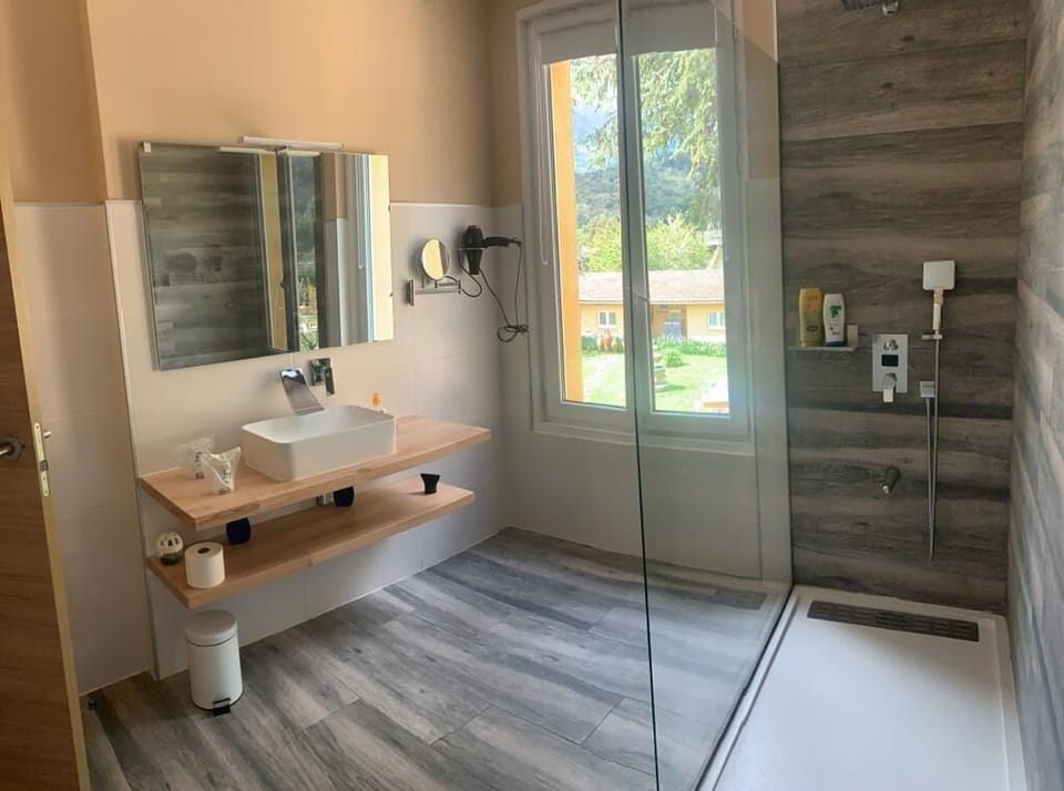 Double Room | Bathroom | Shower, hair dryer, bathrobes, towels
