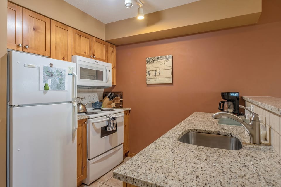 Kitchen with Brand New Granite Counter Tops 