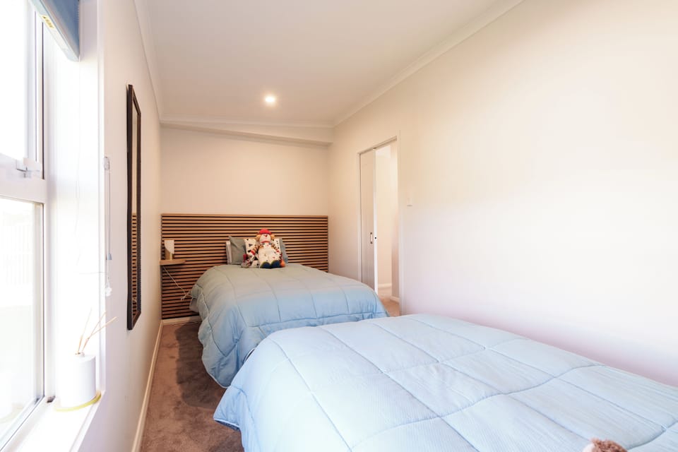 Bedroom three, 2 single beds