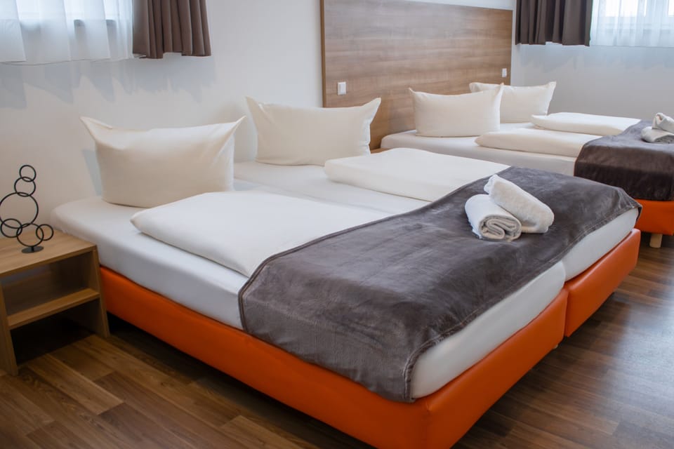 Quadruple Room | Desk, blackout drapes, soundproofing, iron/ironing board (on request)