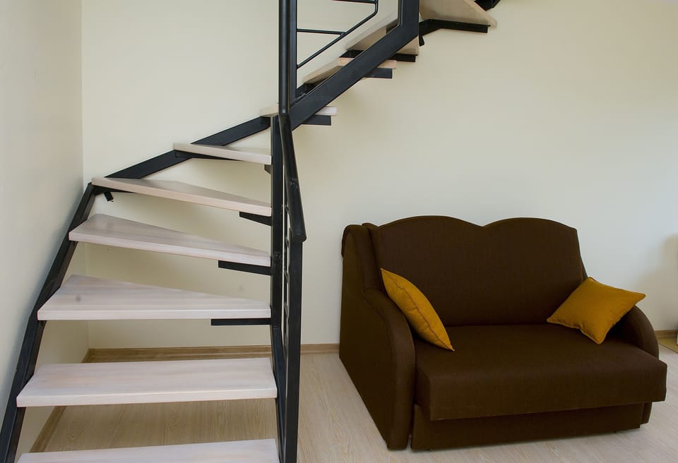 Apartment (two-level) | Living area | Flat-screen TV