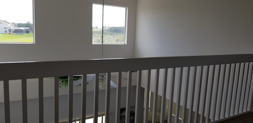 House benefits from double height ceiling in main living area.