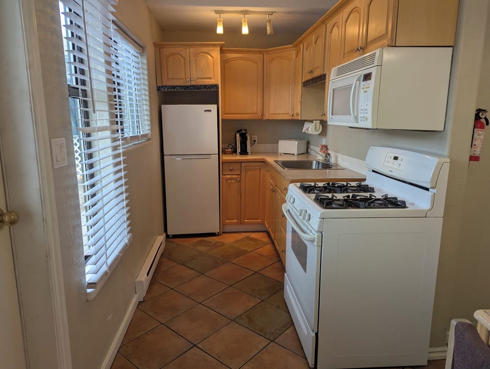Family Suite, 3 Bedrooms | Private kitchen | Coffee/tea maker, microwave