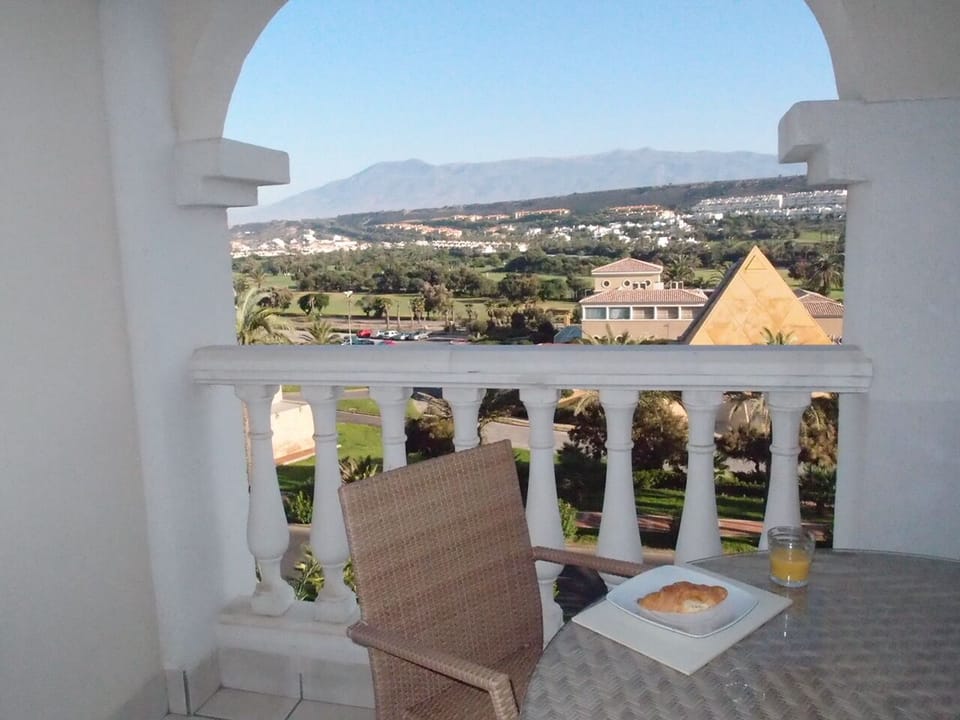 Breakfast on the balcony with the Sierra Nevada mountains in the background