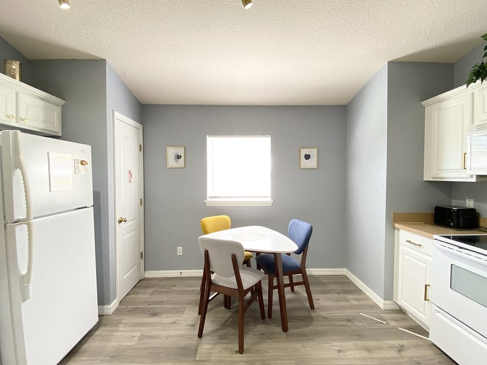 Cozy breakfast nook with natural light, the perfect spot to enjoy your morning coffee or a relaxed m