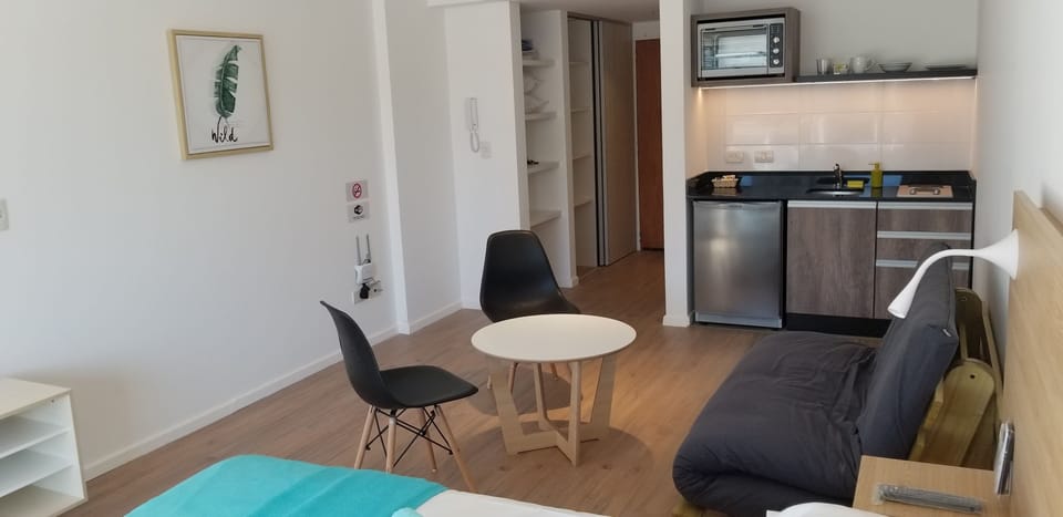 Apartment 502 | Living room | 32-inch flat-screen TV with cable channels, Smart TV