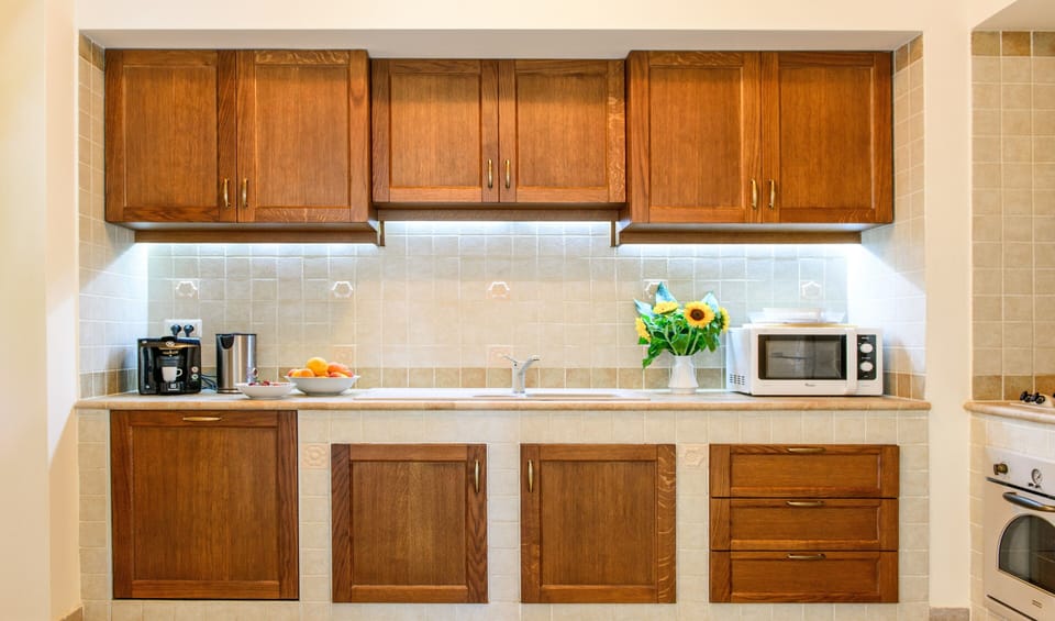 Kitchen with full range of equipment including coffee maker