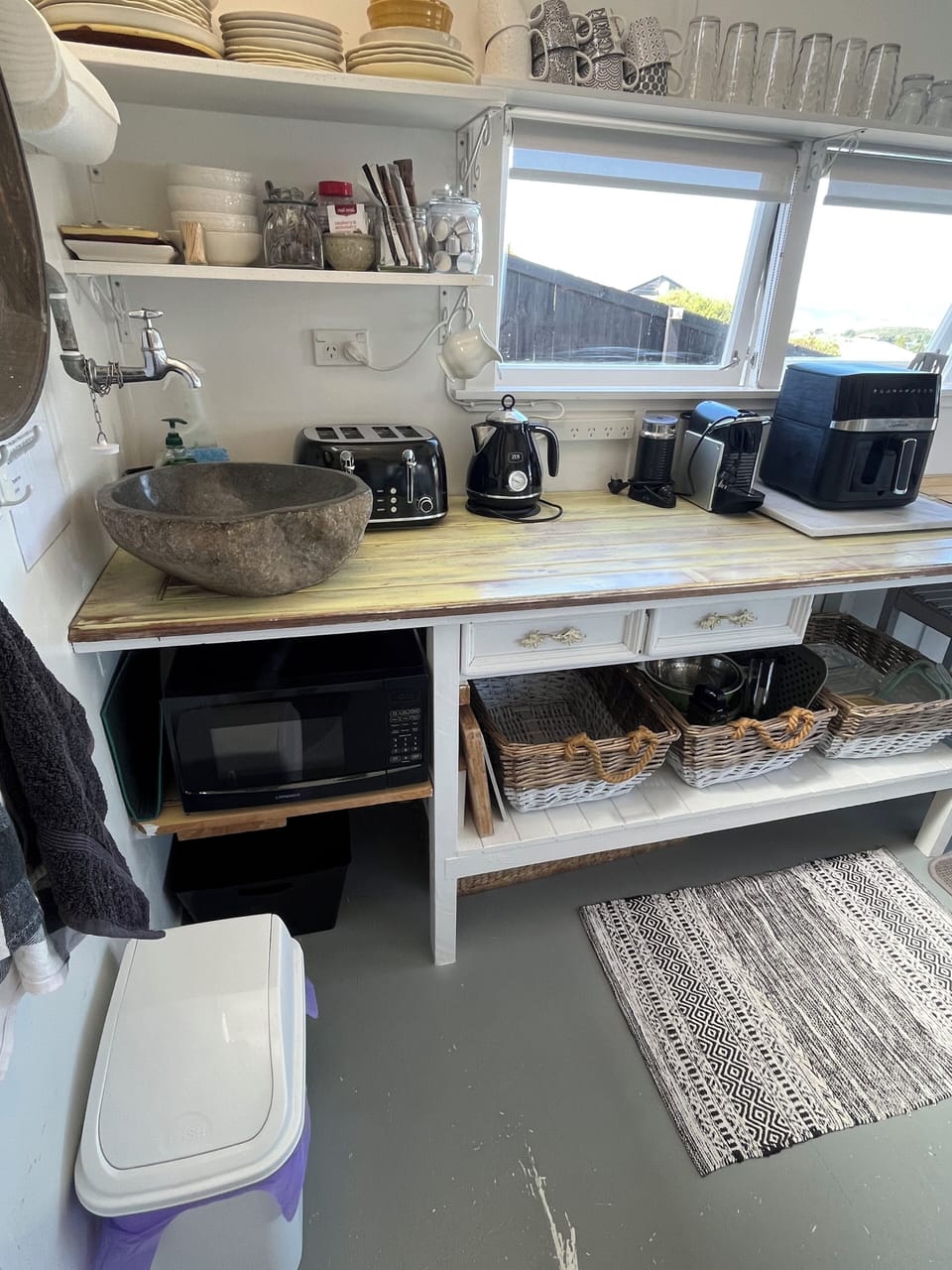 Stone sink with cold water for drinking. toaster, jug ,coffee machine, Airfyer