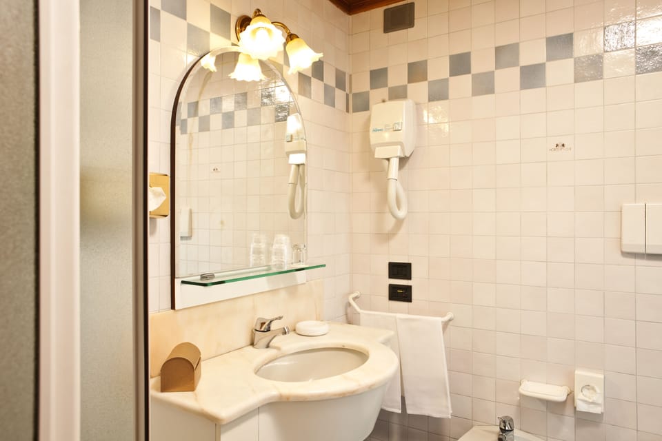 Hair dryer, slippers, bidet