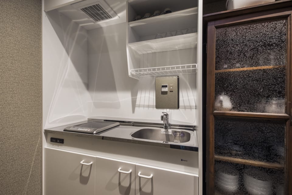 Shiki Homes KYOKA | Private kitchenette | Fridge, microwave, stovetop, electric kettle