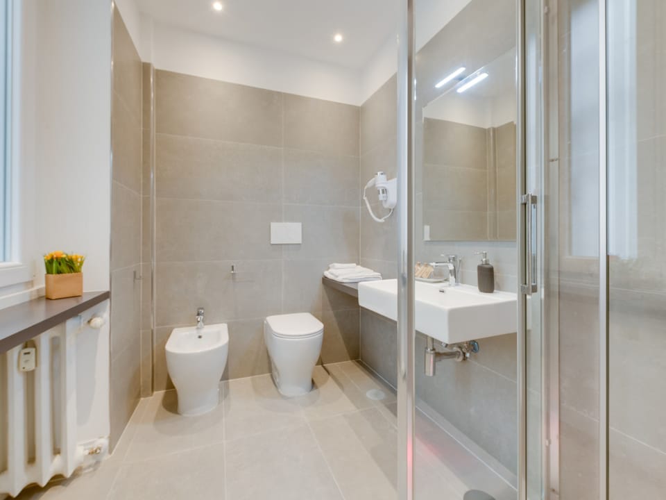 Shower, free toiletries, hair dryer, bathrobes