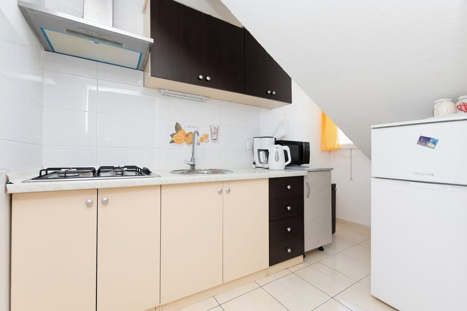 Apartment (A1) | Private kitchen | Espresso maker, coffee/tea maker, fridge, microwave