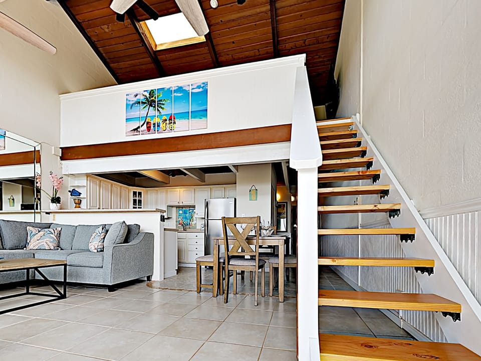 Living Room - With vaulted ceilings and sky lights, this condo is bright and airy!