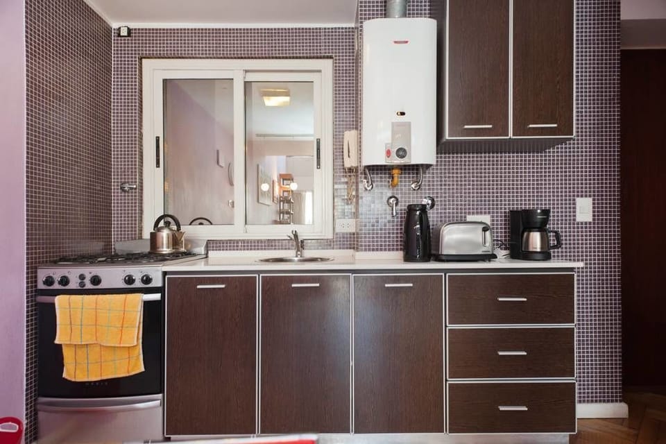 Design Apartment, 1 Bedroom | Private kitchen | Full-size fridge, microwave, oven, stovetop