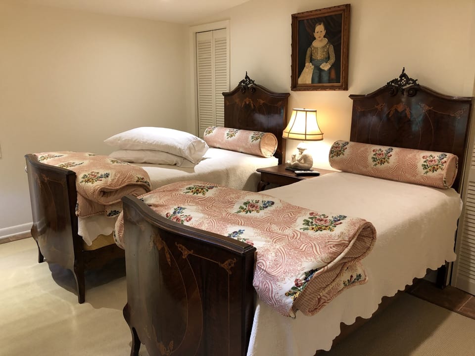 Twin Bedroom. Antique but sturdy beds with new custom mattresses